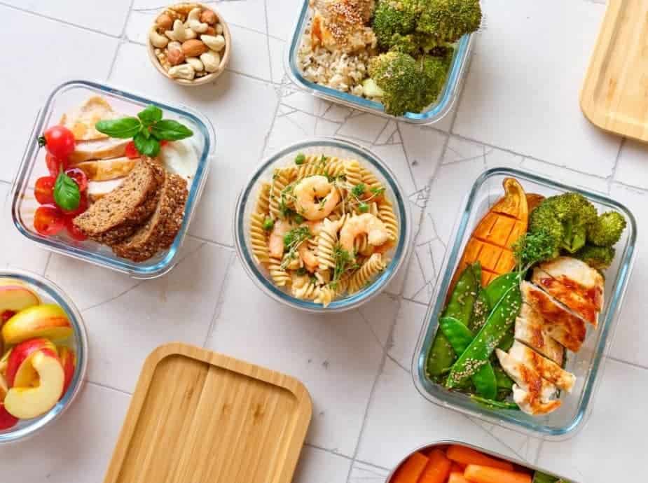 Meal prep containers filled with Mediterranean Diet foods