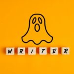 drawing of a ghost on orange background with tiles spelling writer